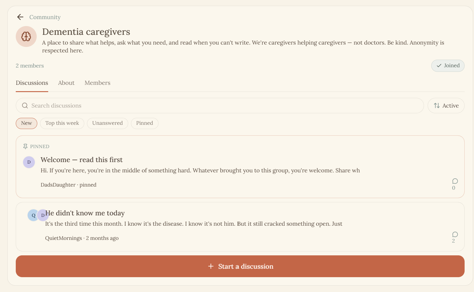 Dementia caregivers community group with pinned welcome post and shared discussions